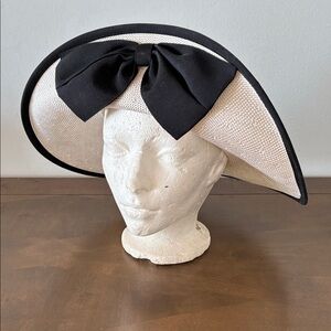 Vintage woven hat with prominent black bow